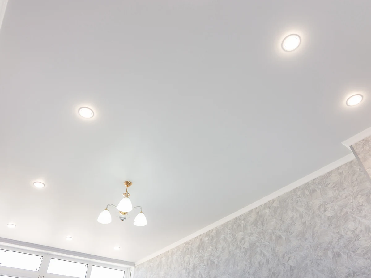 Pristine white stretch ceiling installed by Beaconsfield Decorators