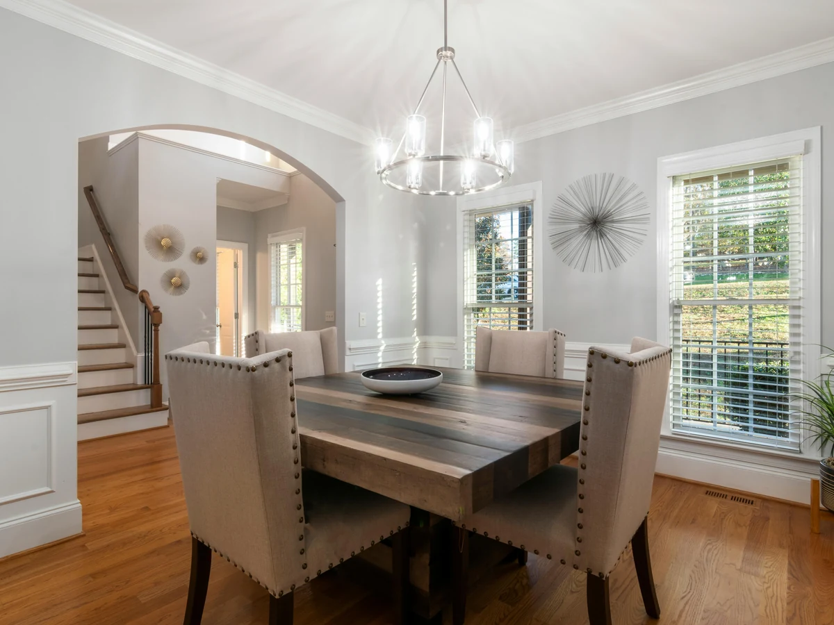 Open-plan dining room with archway painted by Beaconsfield Decorators, Chiltern property