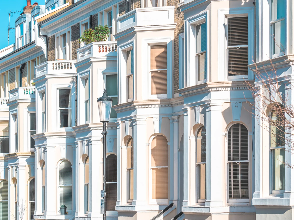 Victorian property exterior painting with ornate white detailing in Amersham