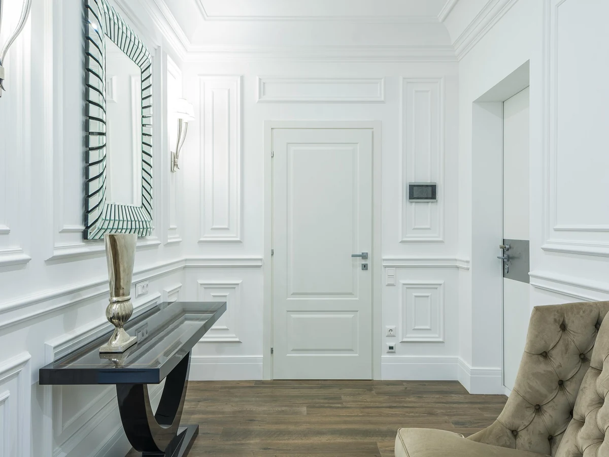 Elegant white hallway painted by Beaconsfield Decorators