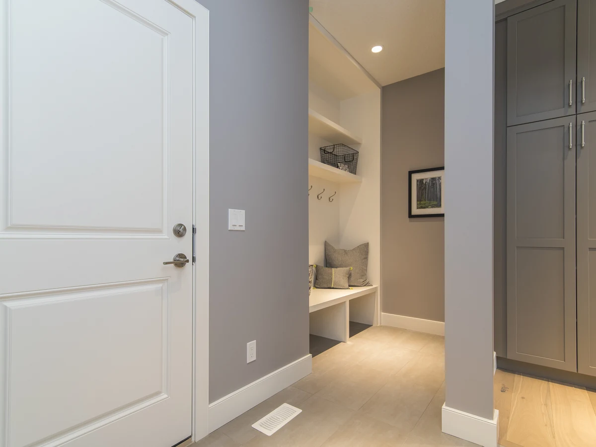 Grey interior mudroom door painted by Beaconsfield Decorators