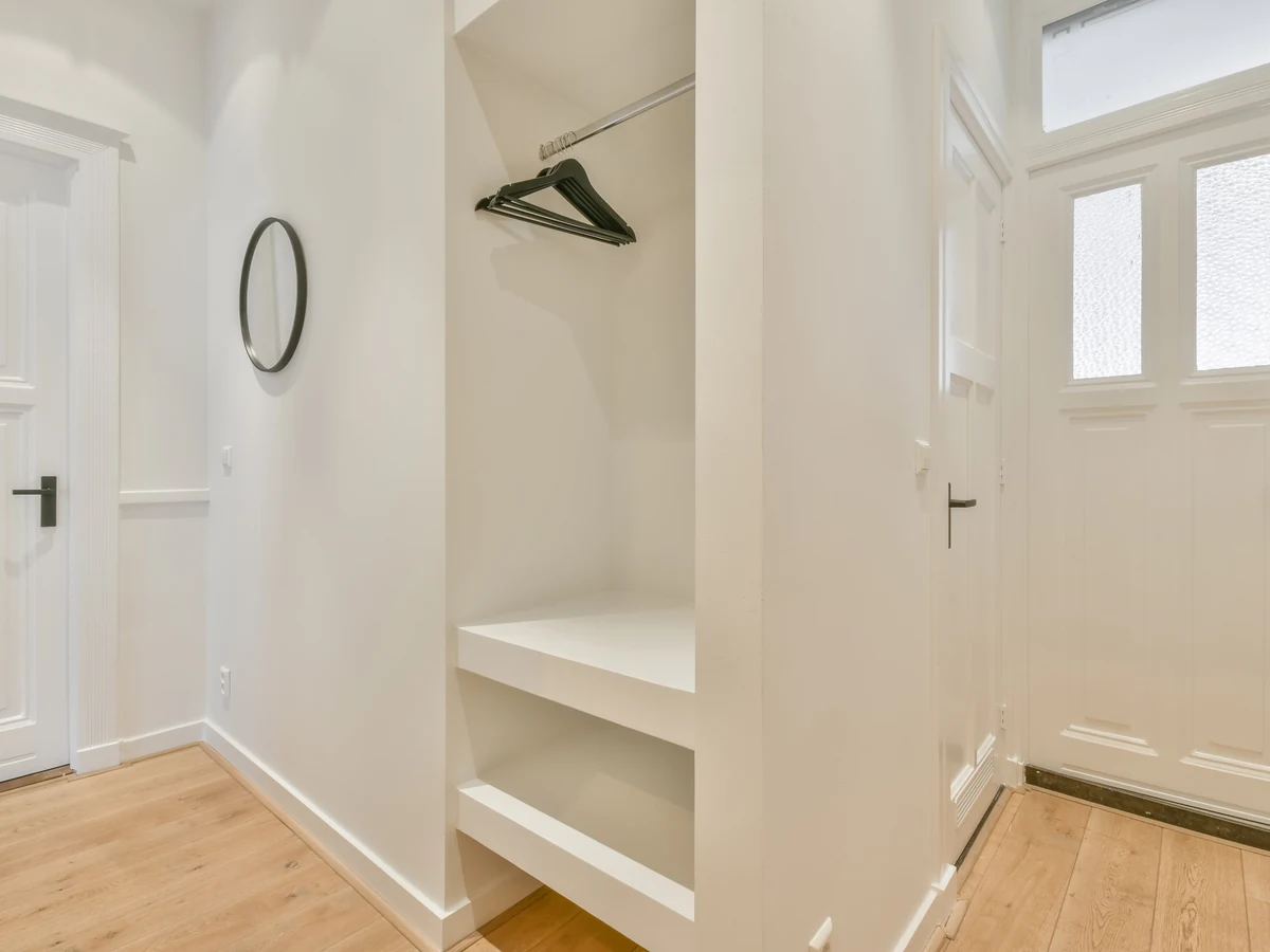 Minimalist white hallway painting, bright and modern, Beaconsfield Decorators