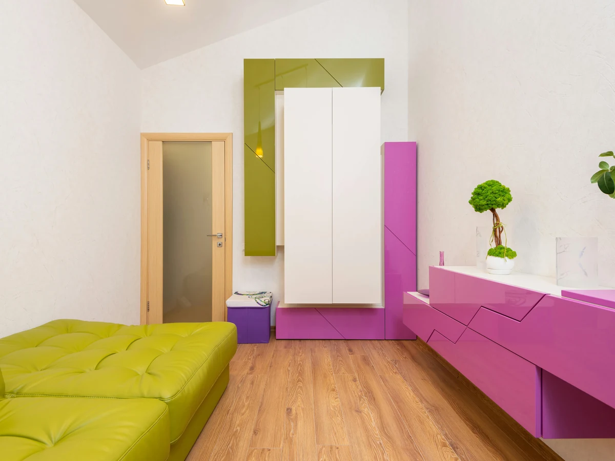 Bright interior room with green painting by Beaconsfield Decorators