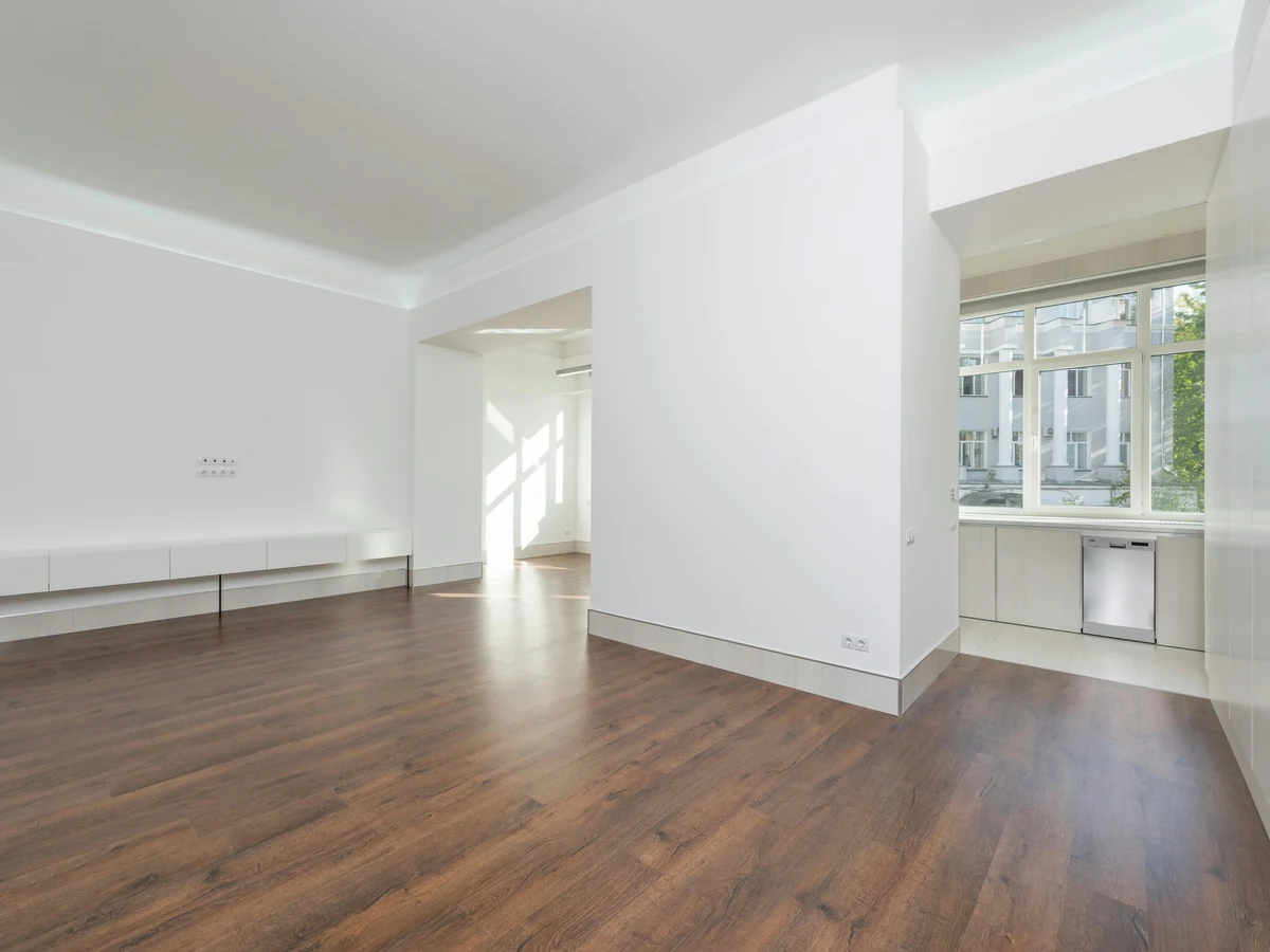 Empty white living room with fresh plasterboard, Beaconsfield Decorators professional painting