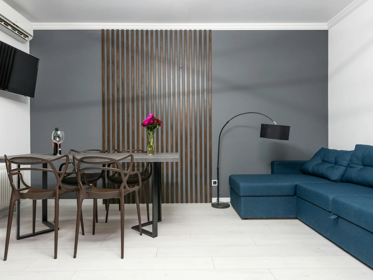 living-room-painting-compact-lounge-teal Teal accent wall in compact lounge by Beaconsfield Decorators