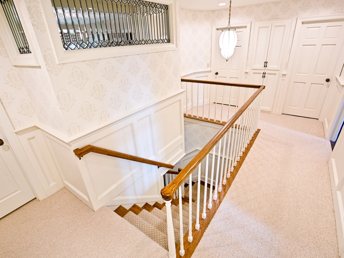 staircase-painting-elegant-white-banister Elegant white painted banister and spindles by Beaconsfield Decorators